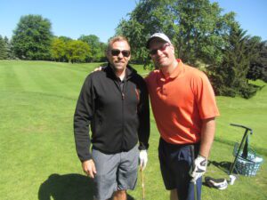 Tomas Holmstrom and Rabbi Jason Miller
